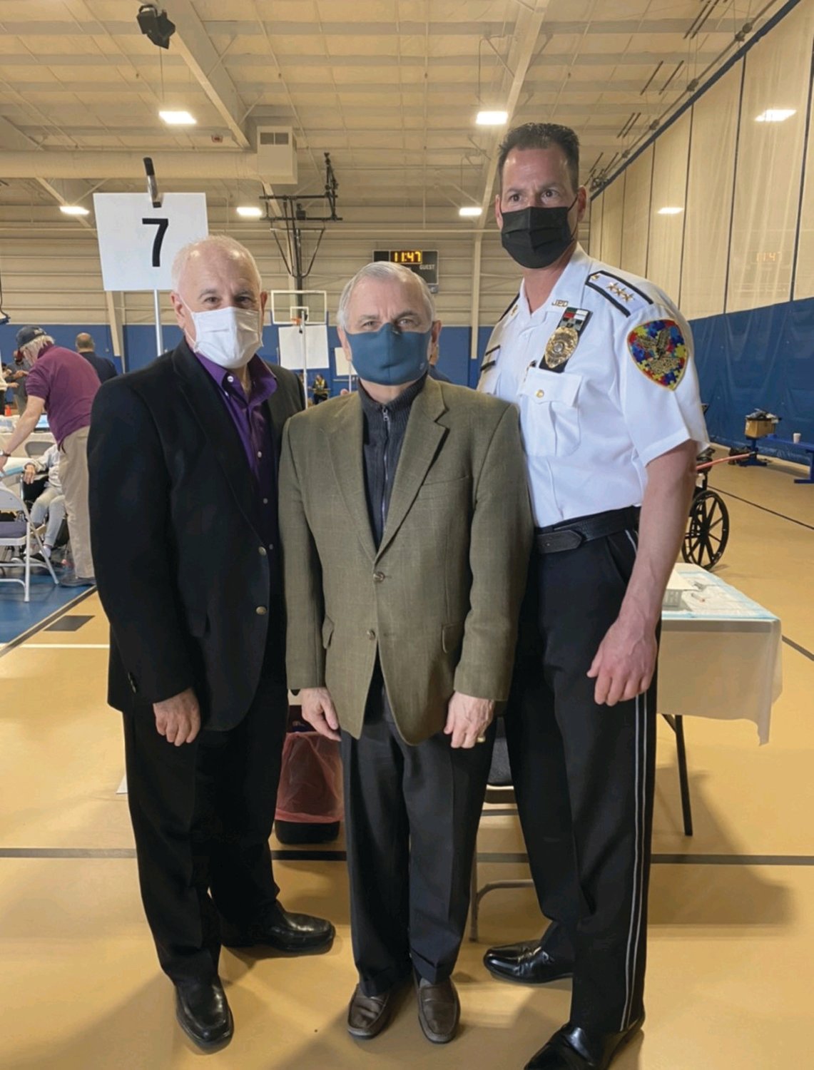 IMPRESSIVE INPUT: U.S. Senator Jack Reed made a special visit to a recent POD Clinic in Johnston and told Mayor Joseph and Police Chief Joseph Razza how impressed he was with the “outstanding organization and social distancing practices” during a host of vaccinations for area residents.